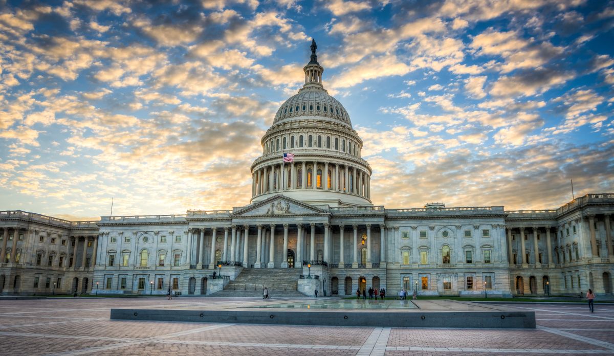 The United States Capital building with clouds at sunset.